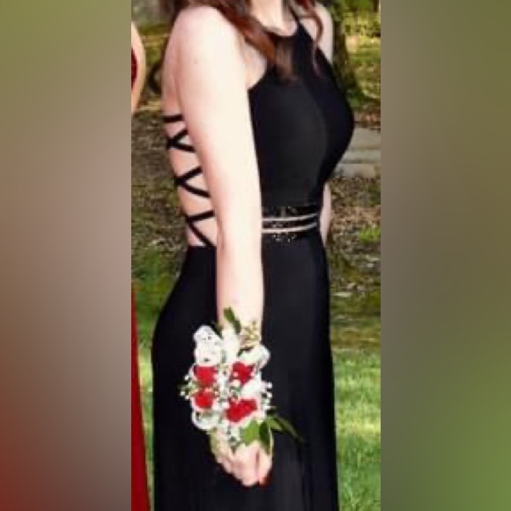 Black formal dress - worn once to prom, size zero. Perfect for formal events.
